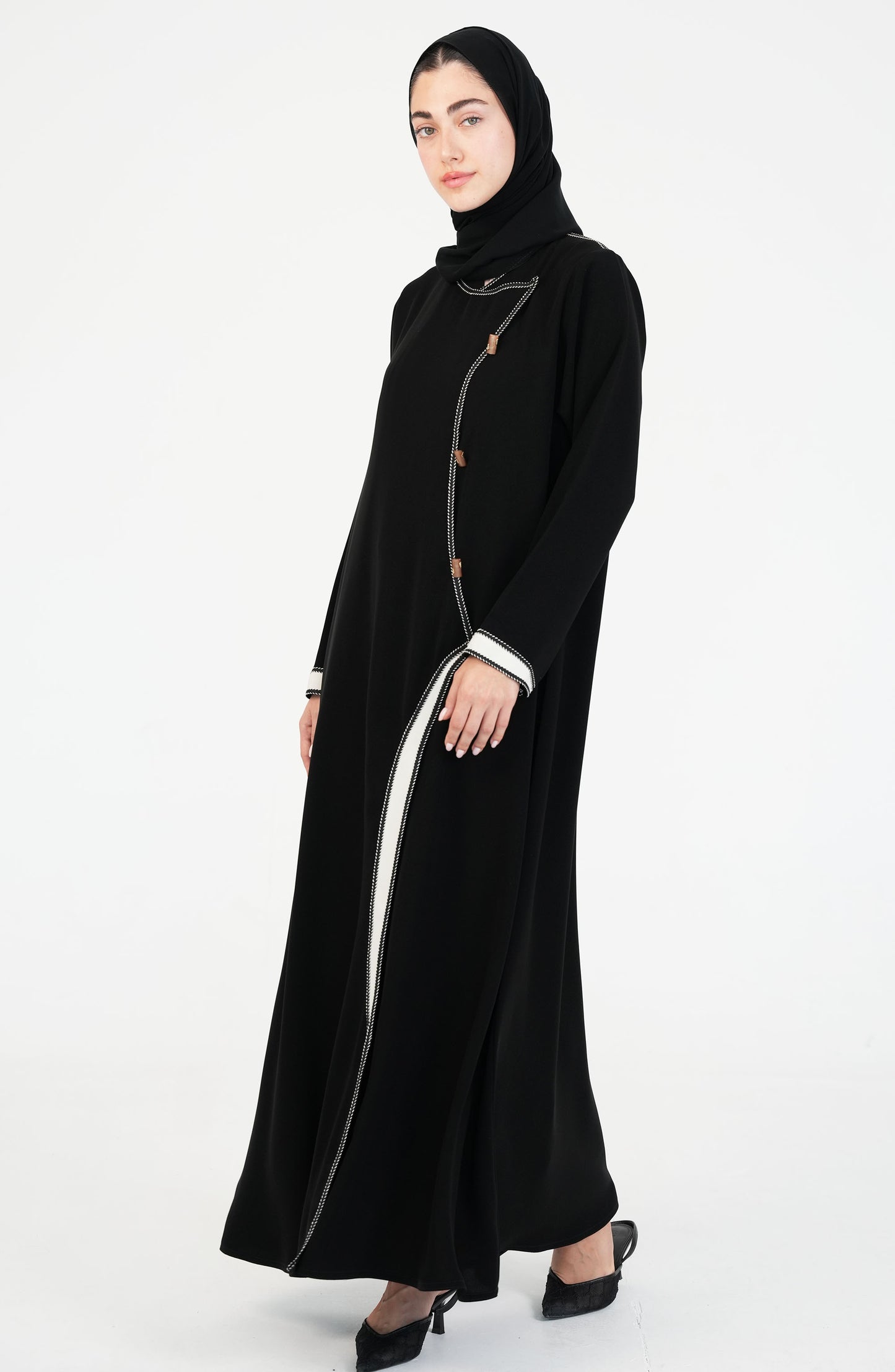Salsa Crepe Abaya embroidery lines in white + gold buttons