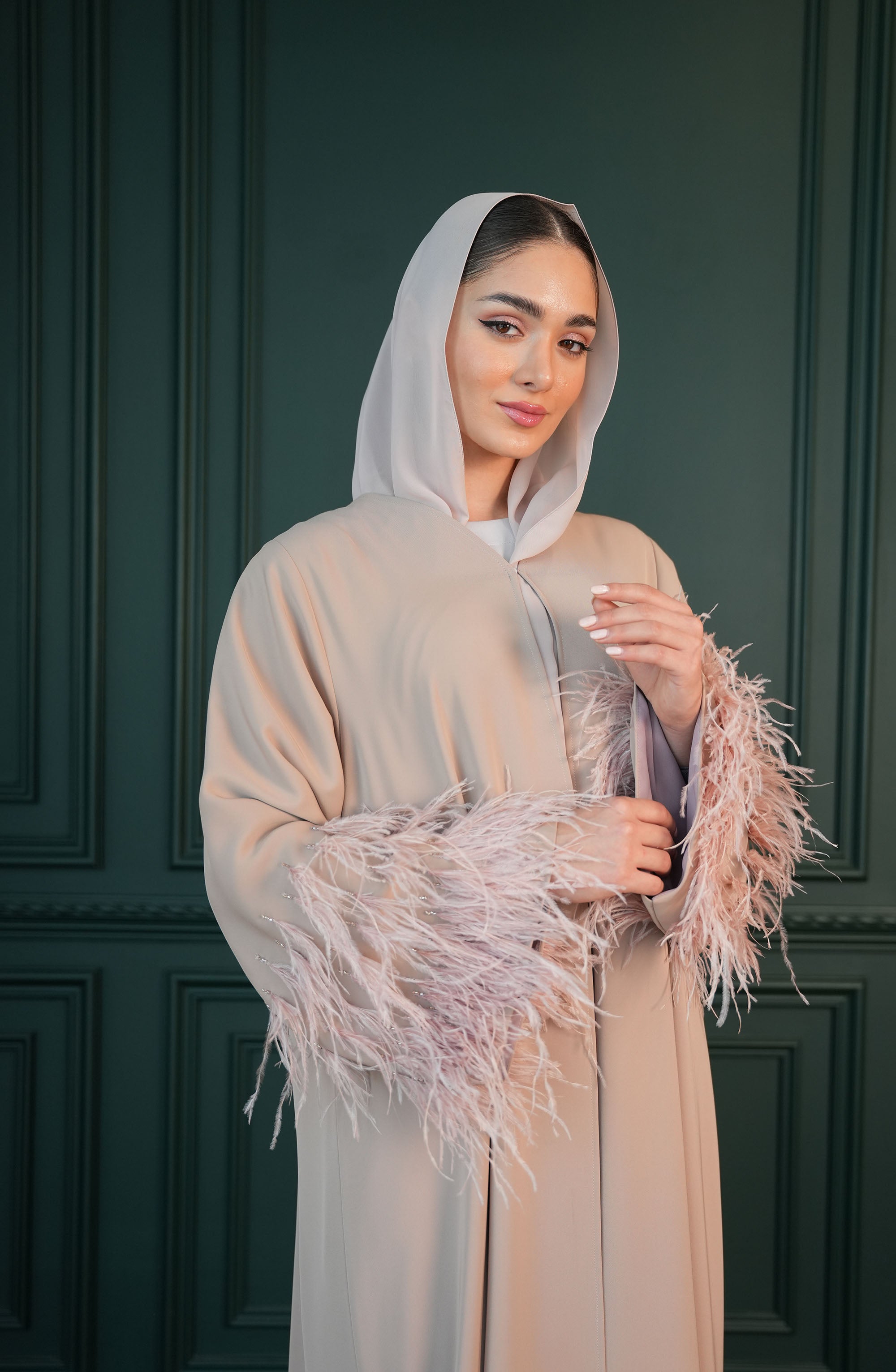 Internet fabric Abaya with feathers and handmade beadwork