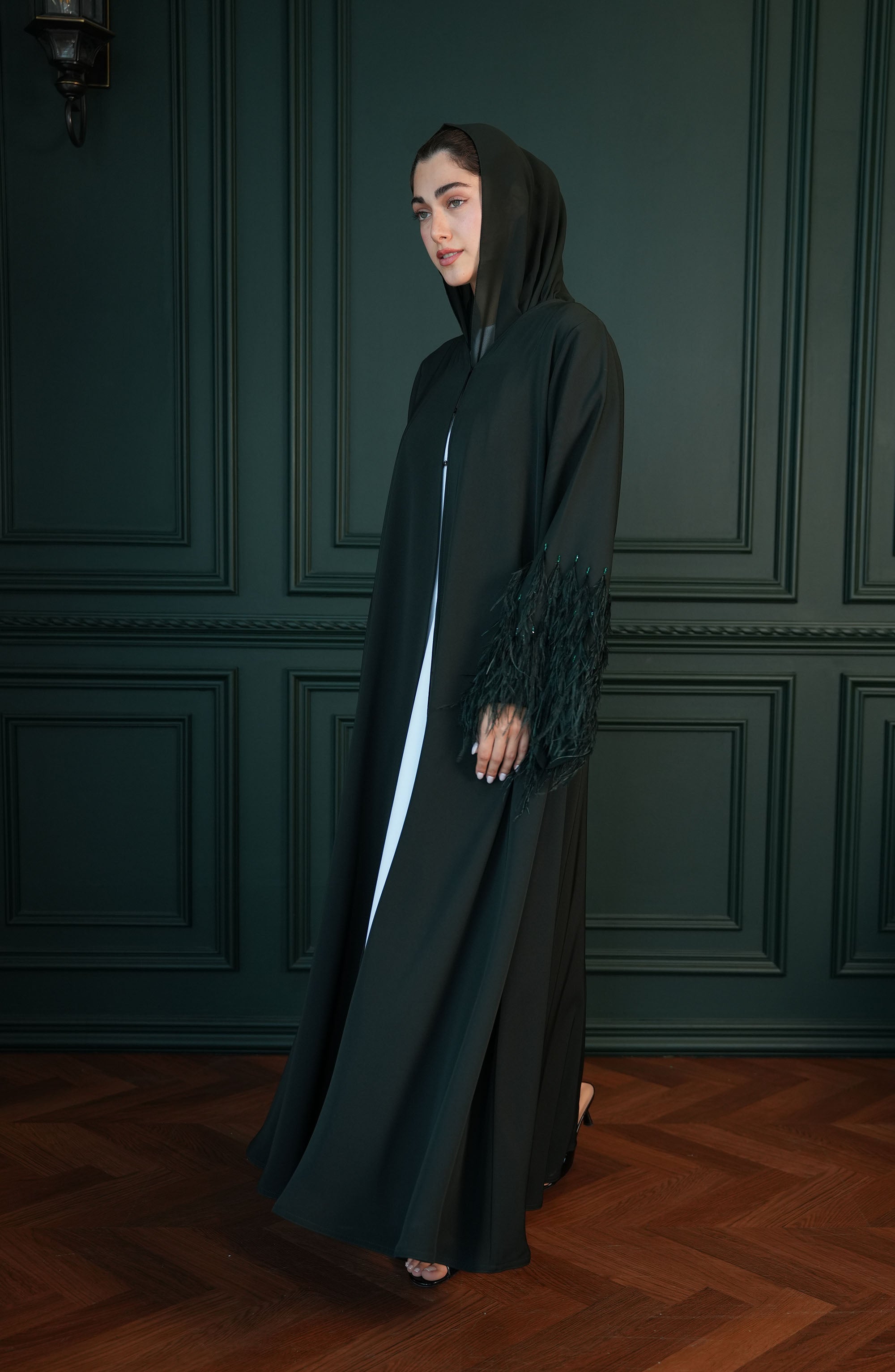 Internet fabric Abaya with feathers and handmade beadwork