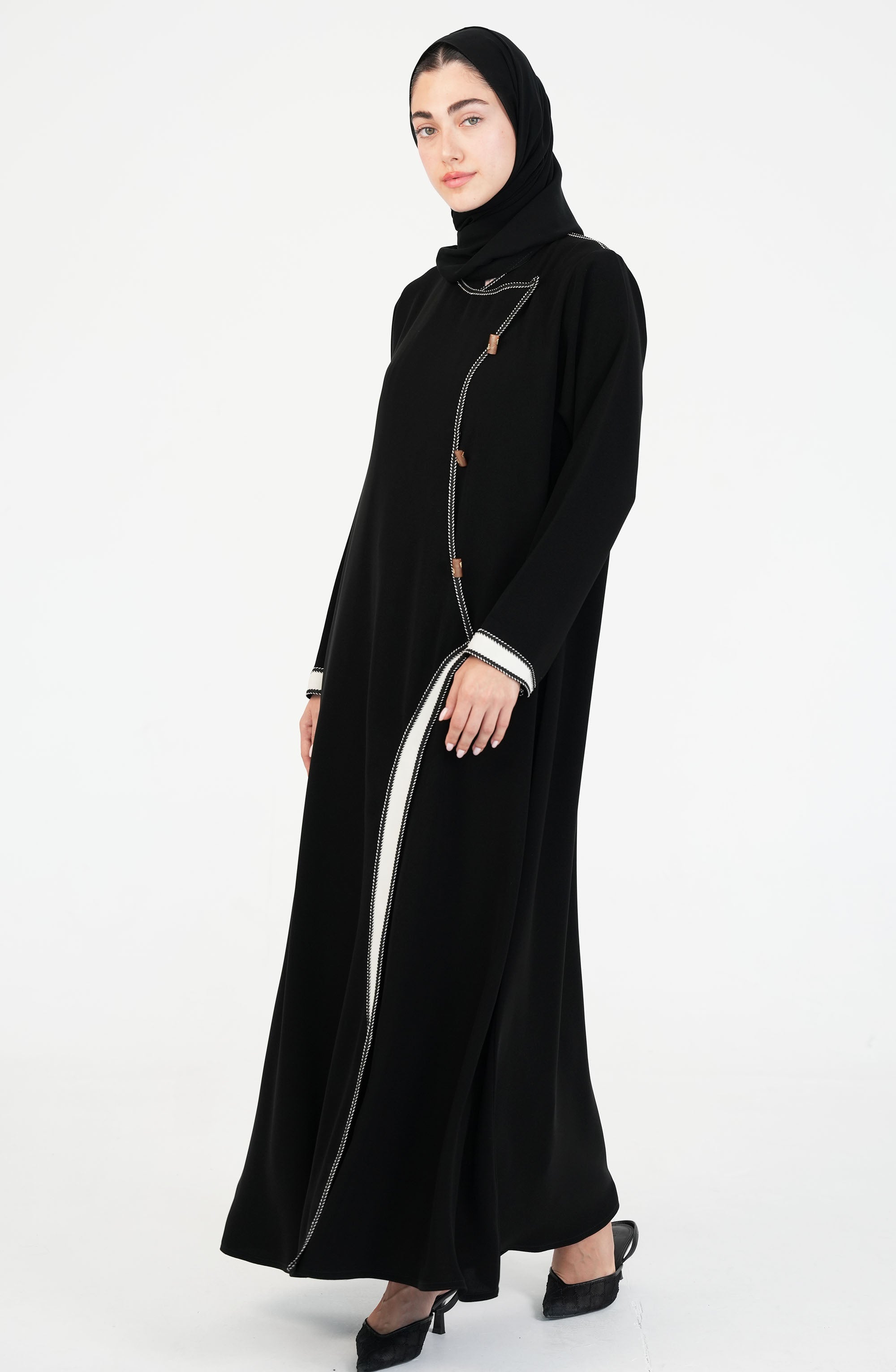 Salsa Crepe Abaya embroidery lines in white + gold buttons