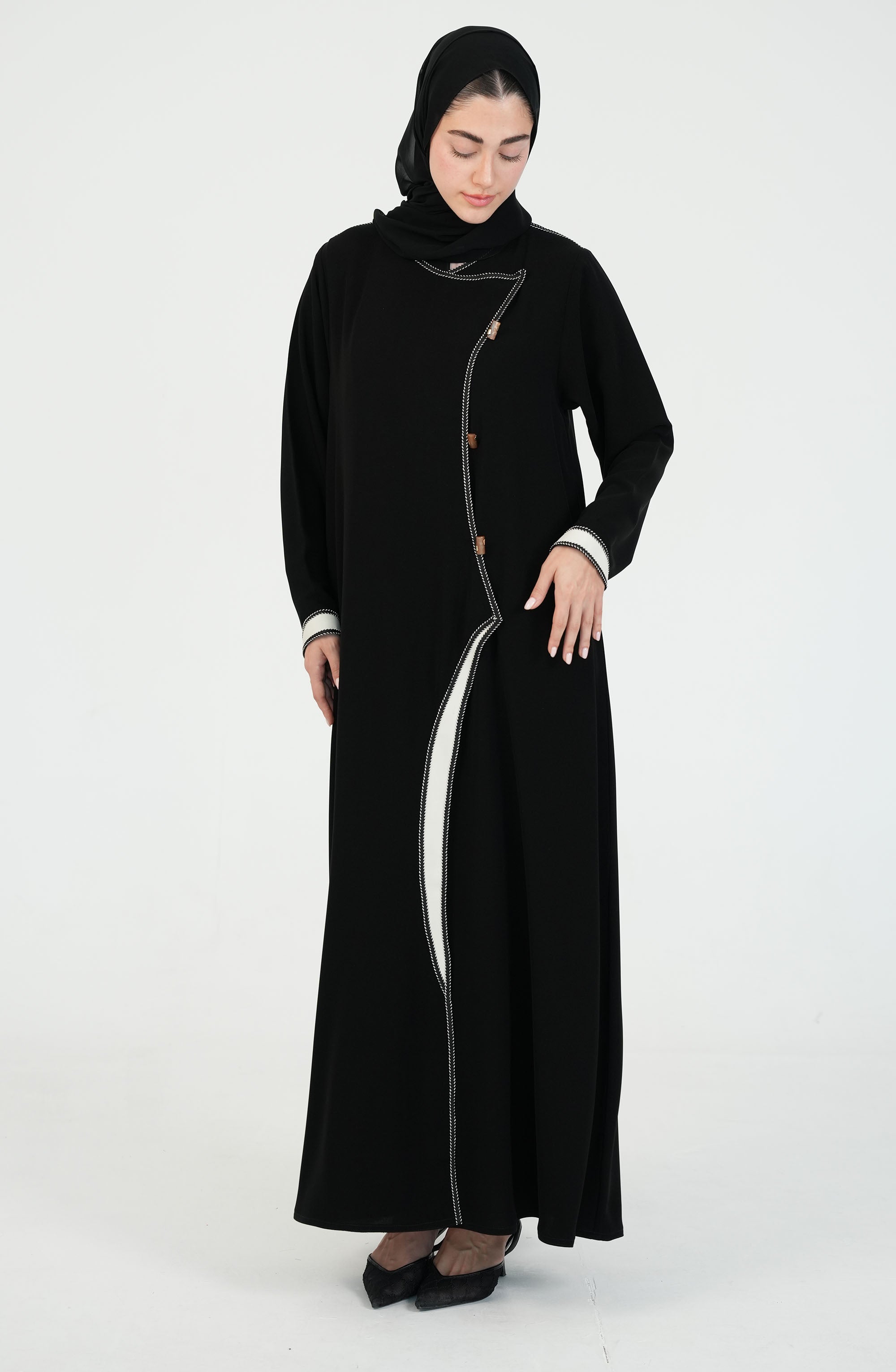 Salsa Crepe Abaya embroidery lines in white + gold buttons