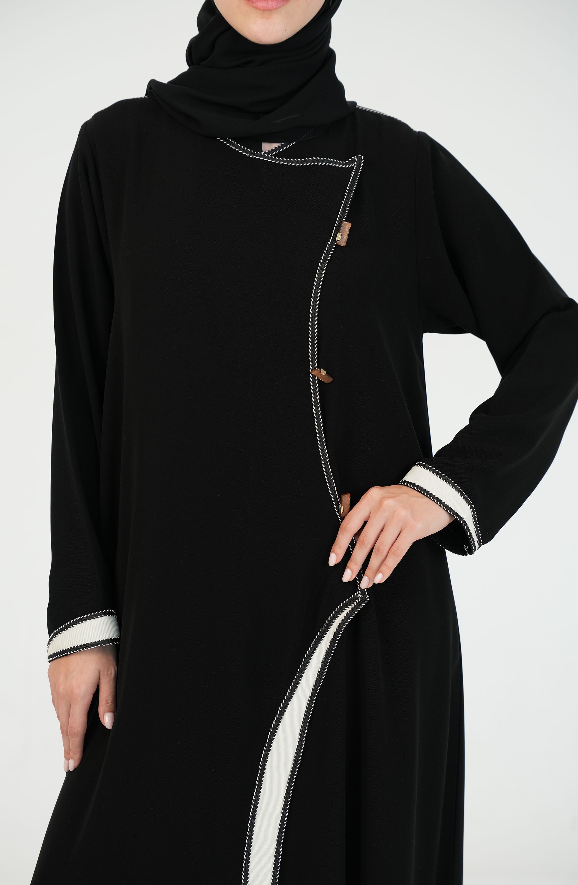 Salsa Crepe Abaya embroidery lines in white + gold buttons